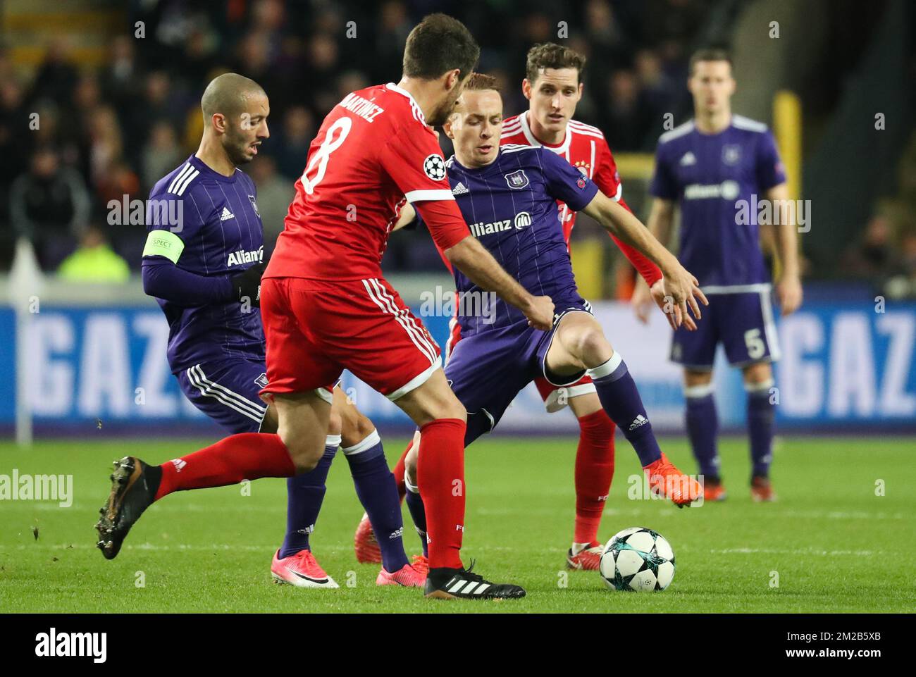 Bayern's Javi Martinez and Anderlecht's Adrien Trebel fight for the ball during a soccer match between Belgian club RSC Anderlecht and German team FC Bayern Munchen, Wednesday 22 November 2017 in Brussels, game five out of six in the group stage (Group B) of the UEFA Champions League competition. BELGA PHOTO VIRGINIE LEFOUR Stock Photo