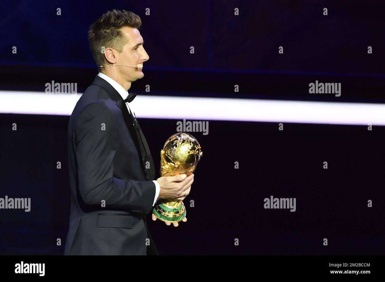 Former German soccer player Miroslav Klose holds the 2018 World Cup trophy during the draw for the 2018 World Cup soccer in Moscow, with Belgium team in pot one, Russia, Friday 01 December 2017. BELGA PHOTO DIRK WAEM  Stock Photo
