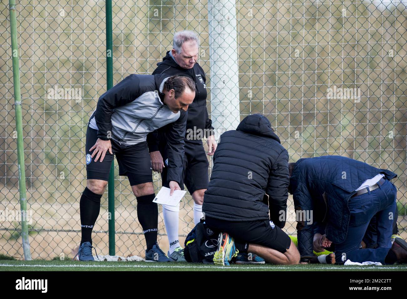 Gent's head coach Yves Vanderhaeghe comes to check out how and Gent's Moses Simon lies injured on the ground during a friendly soccer match between Belgian first division club KAA Gent and German Second Bundesliga team 1. FC Nurnberg, on day five of Gent's winter training camp in Oliva, Spain, Tuesday 09 January 2018. BELGA PHOTO JASPER JACOBS Stock Photo