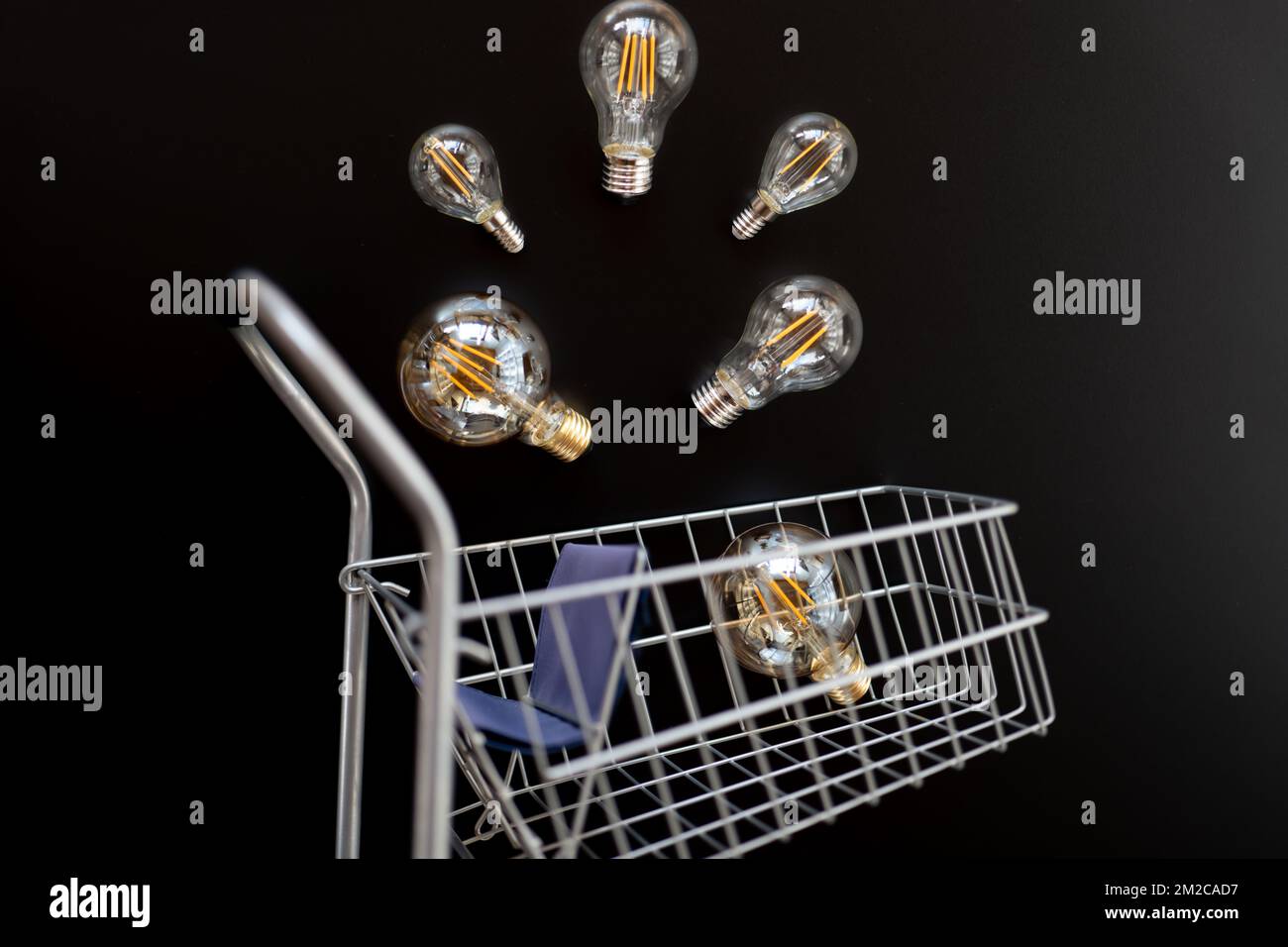 Rising electricity cost. electricity price.Electric lamps set and in a