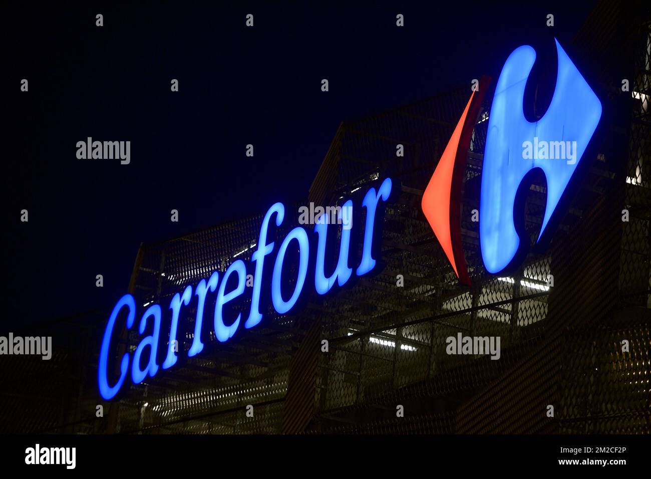 Illustration picture shows Carrefour logo at Genk Carrefour Hypermarket in Genk region, Thursday 25 January 2018. The Carrefour direction announced its reform plans for the supermarket chain, two must close, Belle Ile and Genk and around 1200 jobs will be lost. BELGA PHOTO SOPHIE KIP Stock Photo