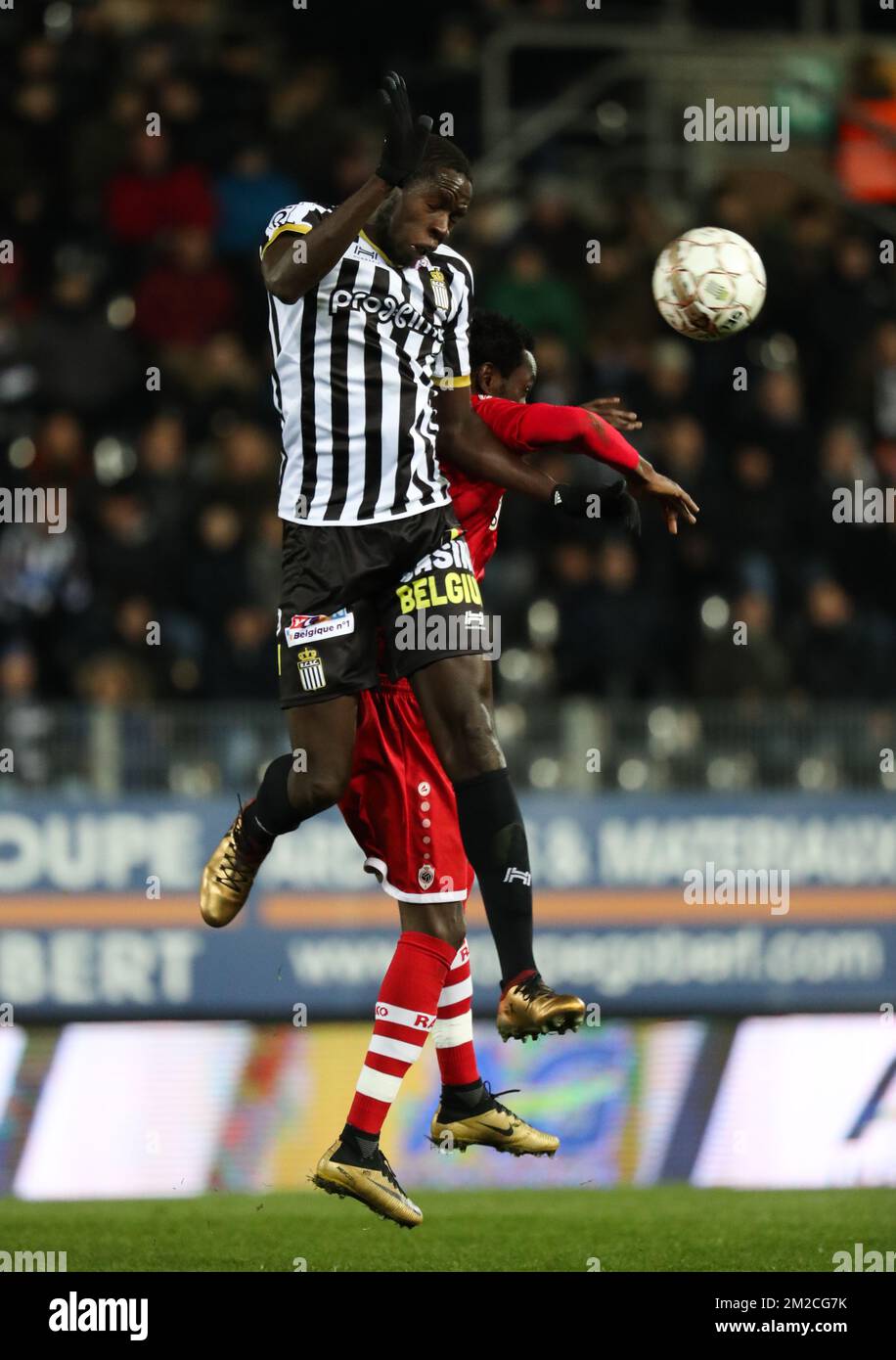 Charleroi’s Christophe Diandy and Antwerp’s Jonathan Pitroipa 