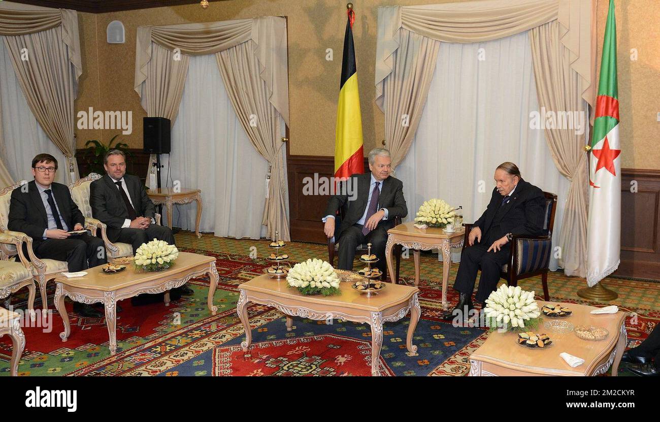 Vice-Prime Minister and Foreign Minister Didier Reynders (C) and Algeria President Abd al-Aziz Bouteflika (R) meet on the second day of a visit to Algeria, Wednesday 31 January 2018, in Algiers. Belgian Foreign Minister is on a two days visit to Algeria. BELGA PHOTO POOL  Stock Photo