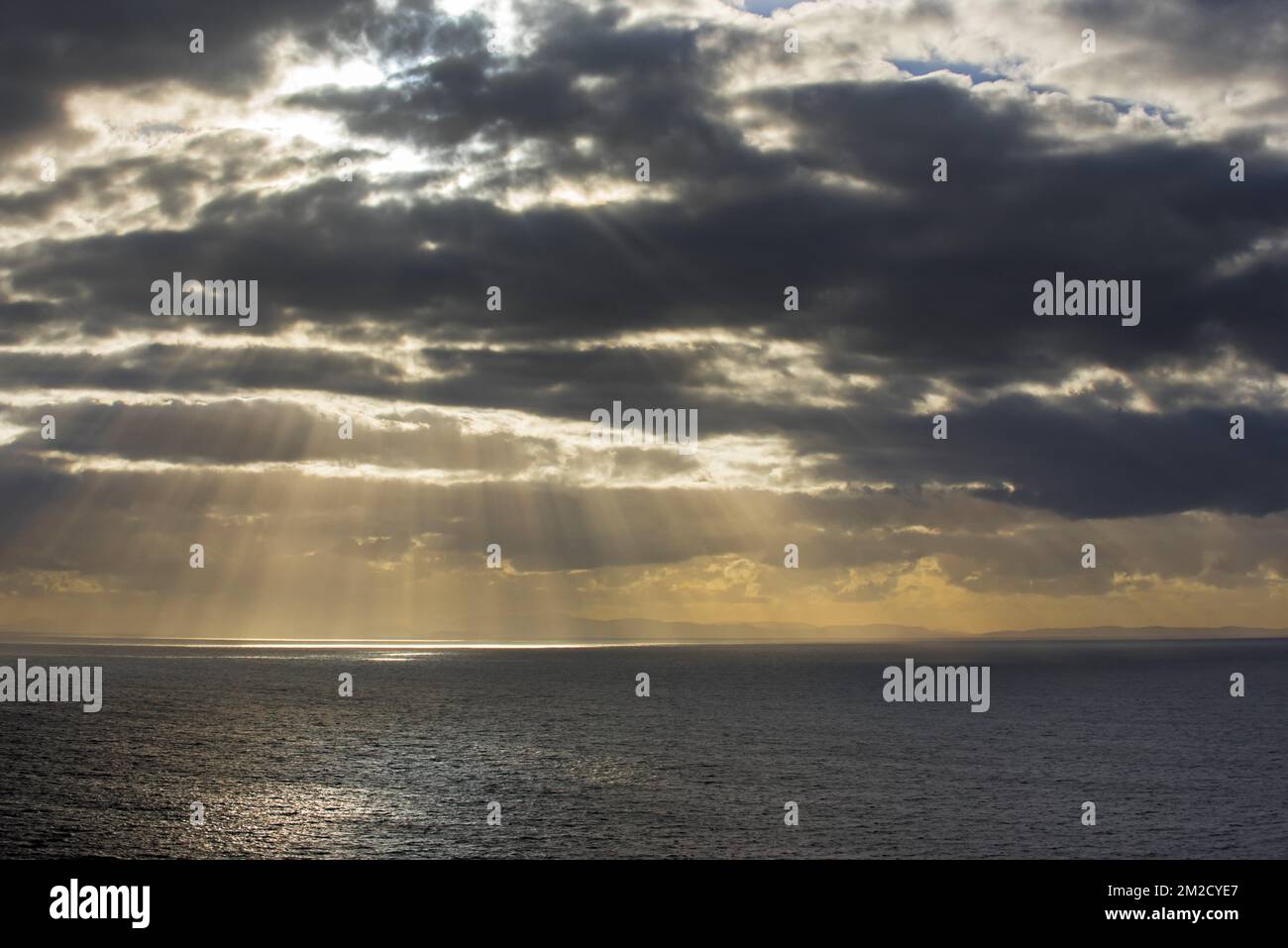 Sun bursting through rain clouds hi-res stock photography and images - Alamy