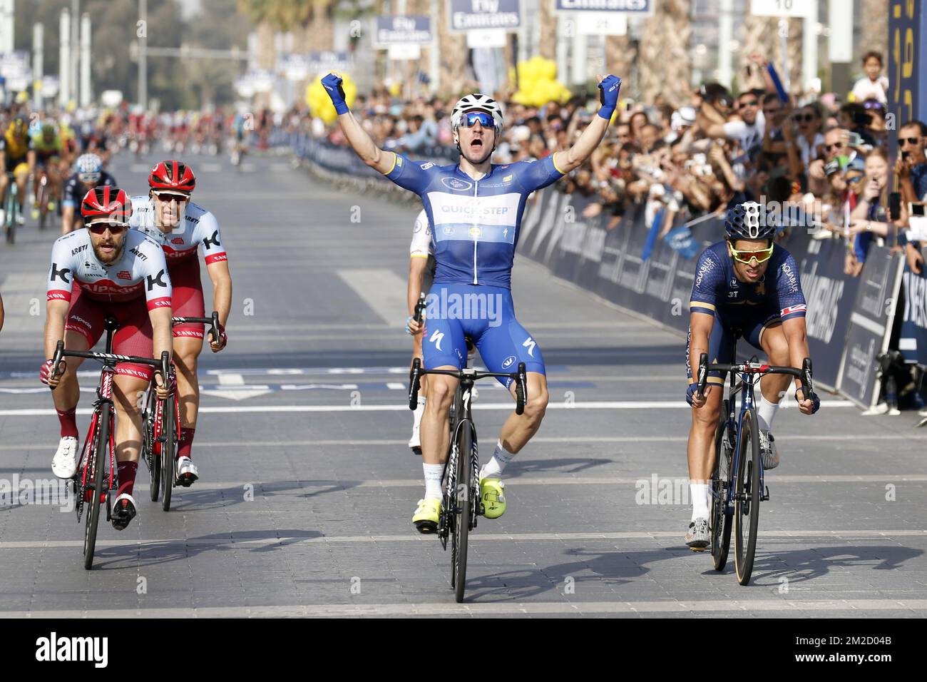 Italian Elia Viviani of Quick-Step Floors celebrates his victory at the sprint ahead of, Austrian Marco Haller of Katusha-Alpecin and British Adam Blythe of Aqua Blue Sport the fifth and last stage of the Dubai Tour 2018 cycling race, 129 km from the Skydive and the city WAlk in Dubai, United Arab Emirates, Saturday 10 February 2018. The Dubai Tour 2018 is taking place from 6 to 10 February. BELGA PHOTO YUZURU SUNADA Stock Photo