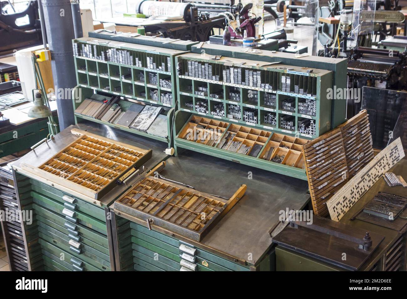 Type case in composing room at printing business, technology for mechanical typesetting text in letterpress printing | Casse, casier destiné à contenir l'ensemble des caractères en plomb d'une même fonte dans imprimerie 11/02/2018 Stock Photo