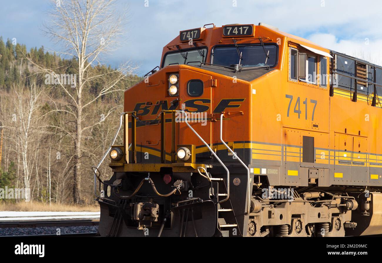 Detail of a BNSF diesel electric train GE ES44AC locomotive number 7417 coming through the rail yard in the town of Troy, Montana. Stock Photo