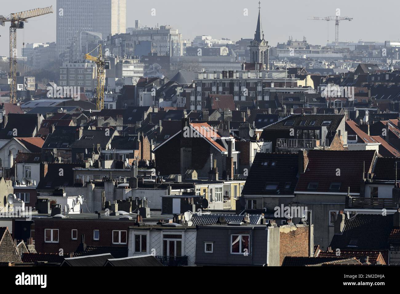 View on the rooftops and the windows of appartements Housing in Brussels, evolution of the price. | Evolition des prix de l'immobilier a Bruxelles Vue sur les toits et les fenetres d'appartements 22/02/2018  Stock Photo