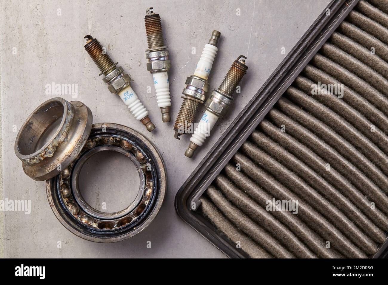 Three kinds of used car spare parts that must be replaced Stock Photo