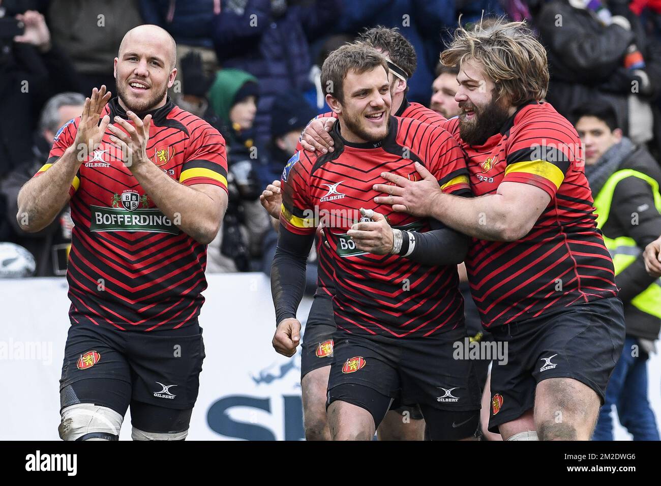 Belgian players celebrate after winning the game between the Black Devils, Belgian  national rugby team, and