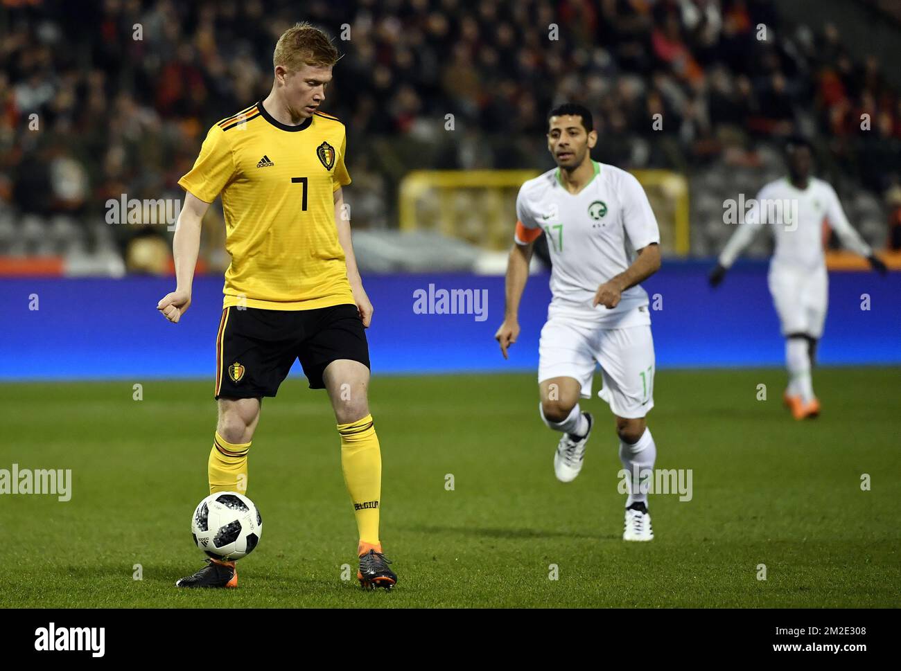 Belgium's Kevin De Bruyne and Saudi Arabia's captain Taisir Al-Jassim pictured in action during a friendly game between the Red Devils Belgian National soccer team and Saudi Arabia, in Brussels, Tuesday 27 March 2018. BELGA PHOTO DIRK WAEM Stock Photo