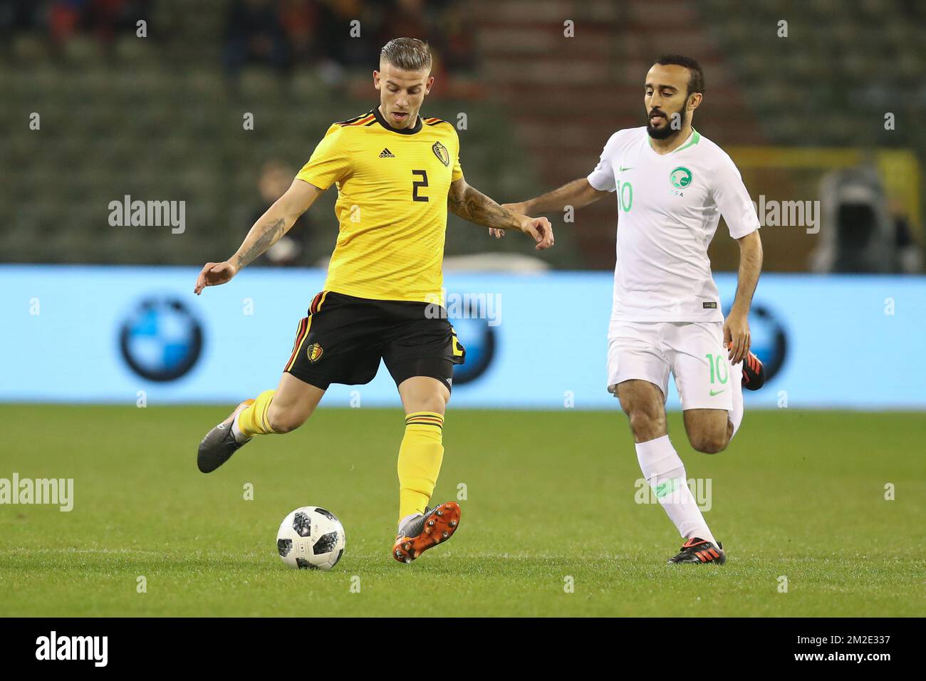 Belgium's Toby Alderweireld and Saudi Arabia's forward Mohammad Al-Sahlawi fight for the ball during a friendly game between the Red Devils Belgian National soccer team and Saudi Arabia, in Brussels, Tuesday 27 March 2018. BELGA PHOTO BRUNO FAHY Stock Photo