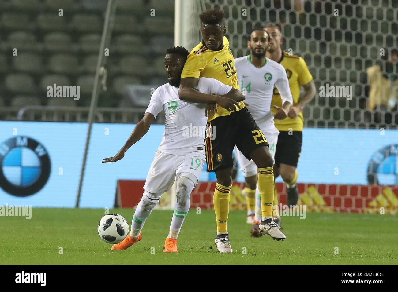 Saudi Arabia's midfielder Fahad Al-Muwallad and Belgium's Anthony Limbombe fight for the ball during a friendly game between the Red Devils Belgian National soccer team and Saudi Arabia, in Brussels, Tuesday 27 March 2018. BELGA PHOTO BRUNO FAHY Stock Photo