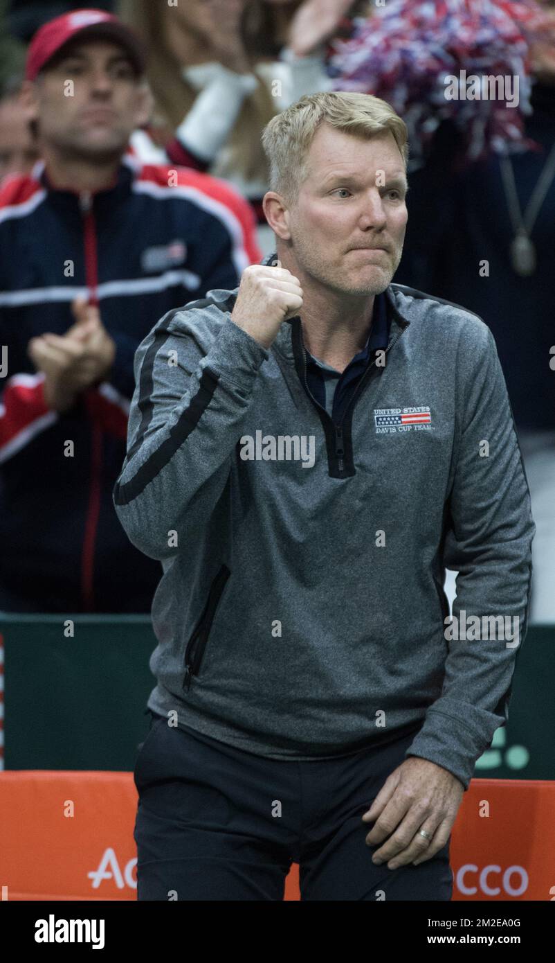 US team captain Jim Courier celebrates after winning a doubles tennis game between US' Ryan Harrison and Jack Sock versus Belgians Sander Gille and Joran Vliegen, the third rubber of the quarterfinals of the Davis Cup World Group tennis between USA and Belgium, Saturday 07 April 2018, in Nashville, United States of America. The Davis Cup meeting is taking place from 6 to 8 April. BELGA PHOTO BENOIT DOPPAGNE BELGA PHOTO BENOIT DOPPAGNE Stock Photo