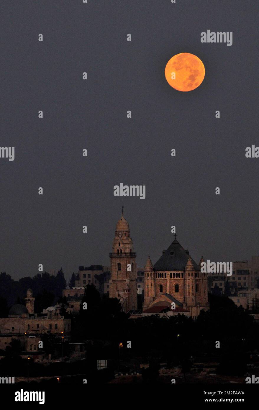 Moonset over the Abbey of the Dormition on Mount Zion in Jerusalem,Israel. Stock Photo