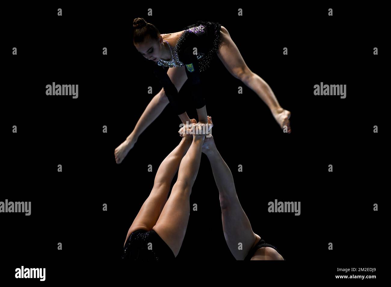 Ukraine group Nataliia Kolmohorova, Anhelina Kozolup and Kateryna Shevchuk pictured in action during the second day of the 26th edition of the world championships acrobatic gymnastics in Antwerp, Saturday 14 April 2018. BELGA PHOTO DIRK WAEM Stock Photo