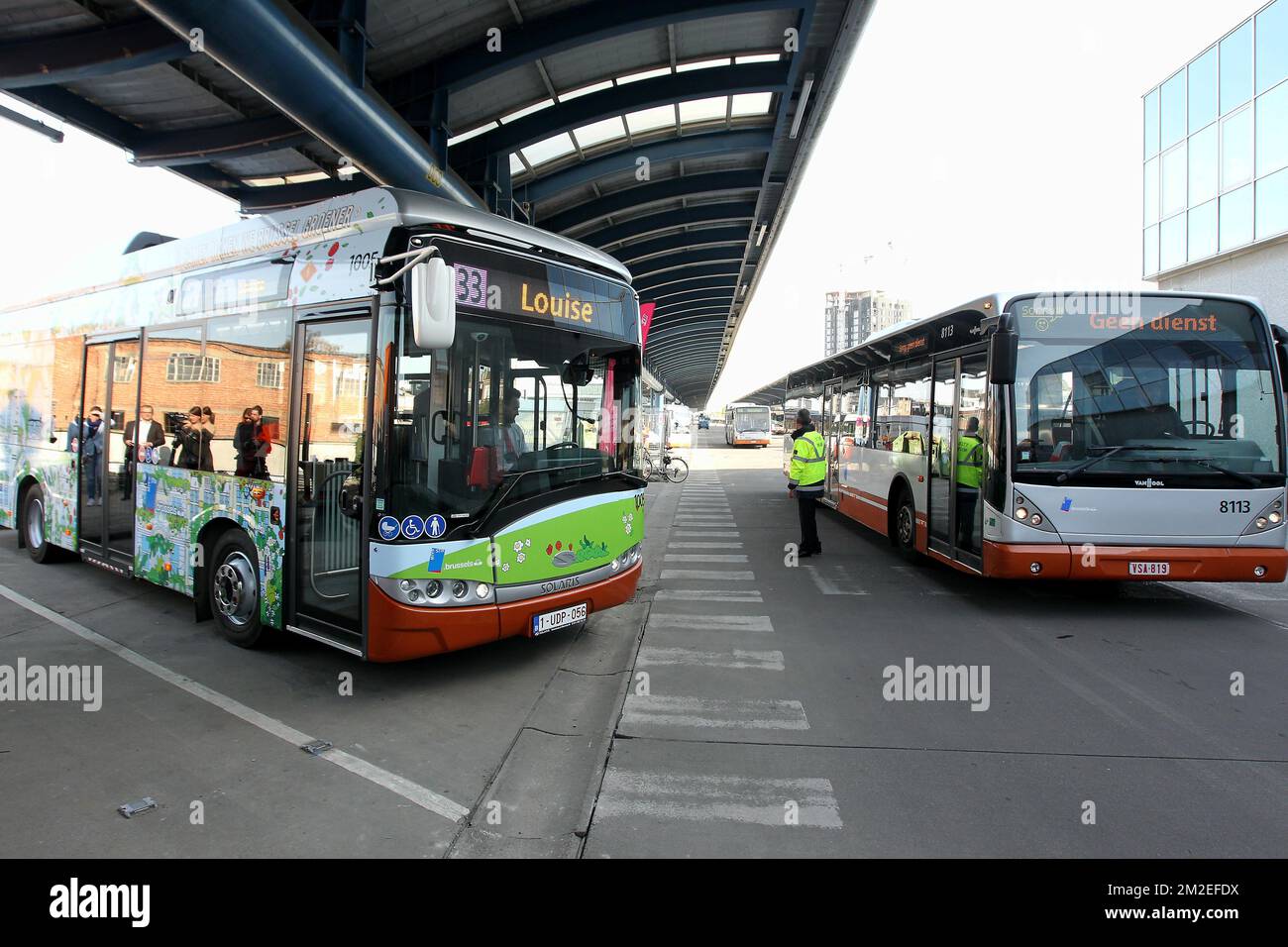 The New Electric Bus (L) And An Older Model (R) Pictured During The ...