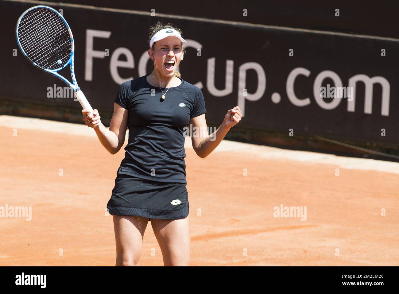 Belgian Elise Mertens celebrates after winning a tennis game between  Italian Sara Errani and Belgian Elise Mertens (WTA 17), the third rubber of  this weekend's Fed Cup World Group Play Off meeting