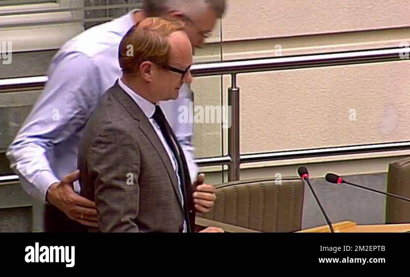 This screengrab, taken from the Flemish Parliament live streaming, shows Flemish Minister of Mobility, Public Works, Flemish municipalities around Brussels, Animal Welfare Ben Weyts feeling unwell during a plenary session of the Flemish Parliament in Brussels, Wednesday 25 April 2018. BELGA PHOTO HANDOUT  Stock Photo