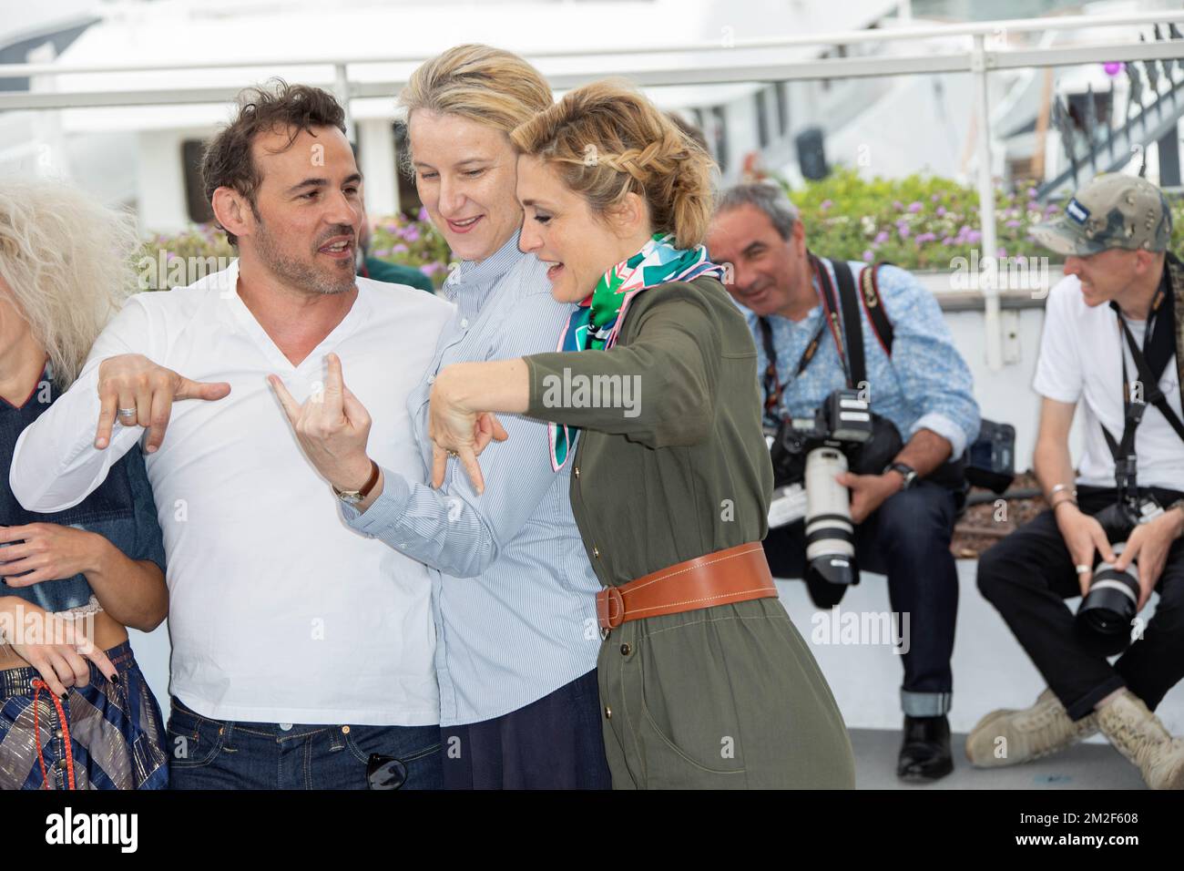 Actor Stephane Rideau, Russian producer Nadia Turincev and French actress and producer Julie Gayet the photocall for the 'Murder Me, Monster (Meurs, Monstre, Meurs)' during the 71st annual Cannes Film Festival at Palais des Festivals | L'acteur Stephane Rideau, la productrice Nadia Turincev Julie Gayet au photocall de 'Murder Me, Monstre, Monster (Meurs, Monstre, Meurs)' lors du 71ème Festival de Cannes au Palais des Festivals. 13/05/2018 Stock Photo