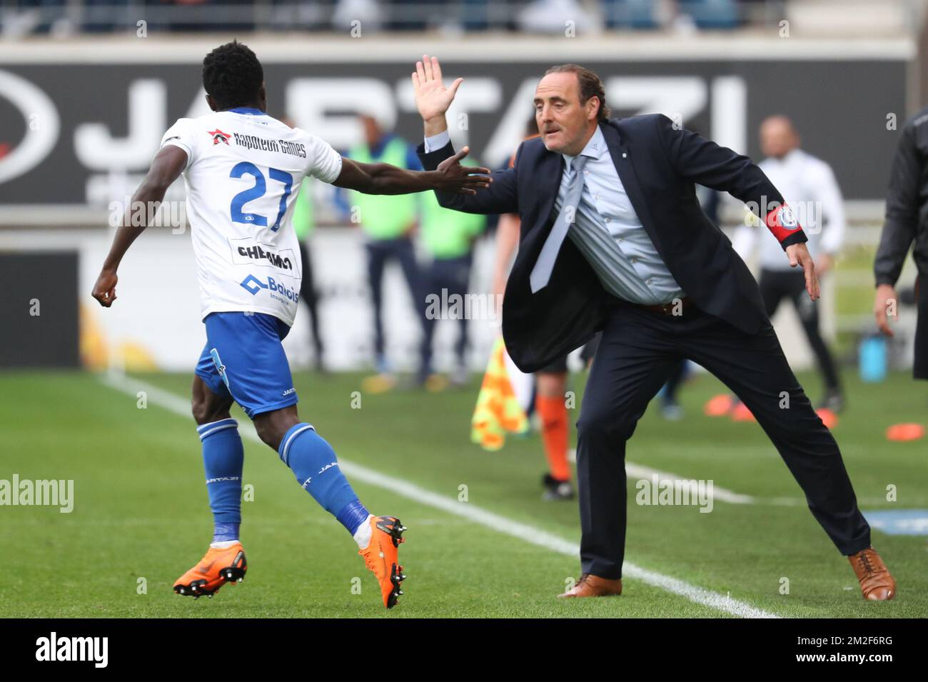 Gent's Moses Simon and Gent's head coach Yves Vanderhaeghe celebrate after scoring during the Jupiler Pro League match of Play-Off group 1, between KAA Gent and RSC Anderlecht, in Gent, Sunday 13 May 2018, on day nine of the Play-Off 1 of the Belgian soccer championship. BELGA PHOTO VIRGINIE LEFOUR Stock Photo