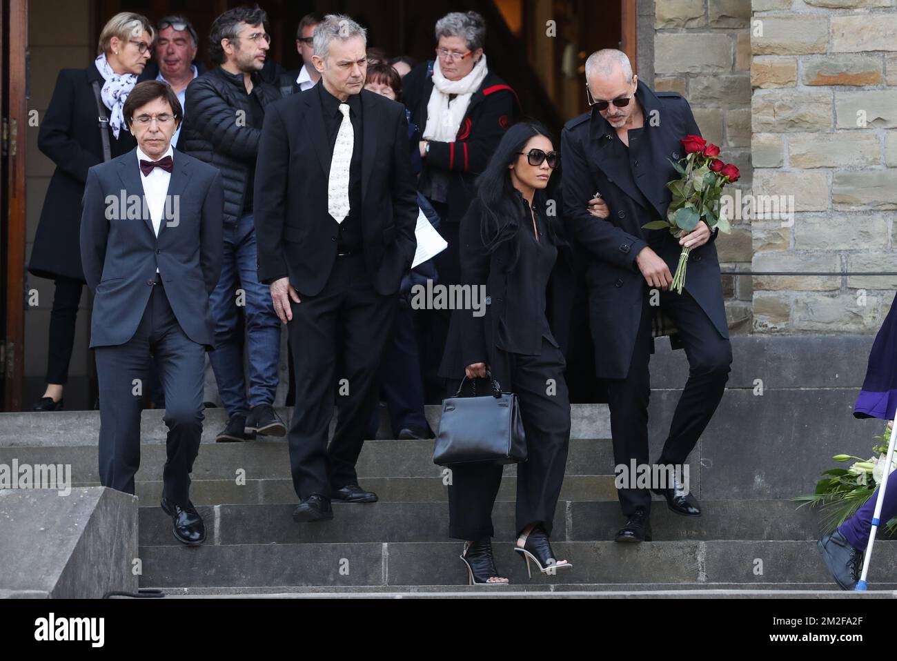 Elio Di Rupo and singer Anggun Cipta Sasmi leave after the funeral ceremony for Belgian singer Maurane (Claudine Luypaerts) Thursday 17 May 2018 in Brussels. Maurane was found dead in her home on May 7th, she was 57 years old. BELGA PHOTO VIRGINIE LEFOUR Stock Photo