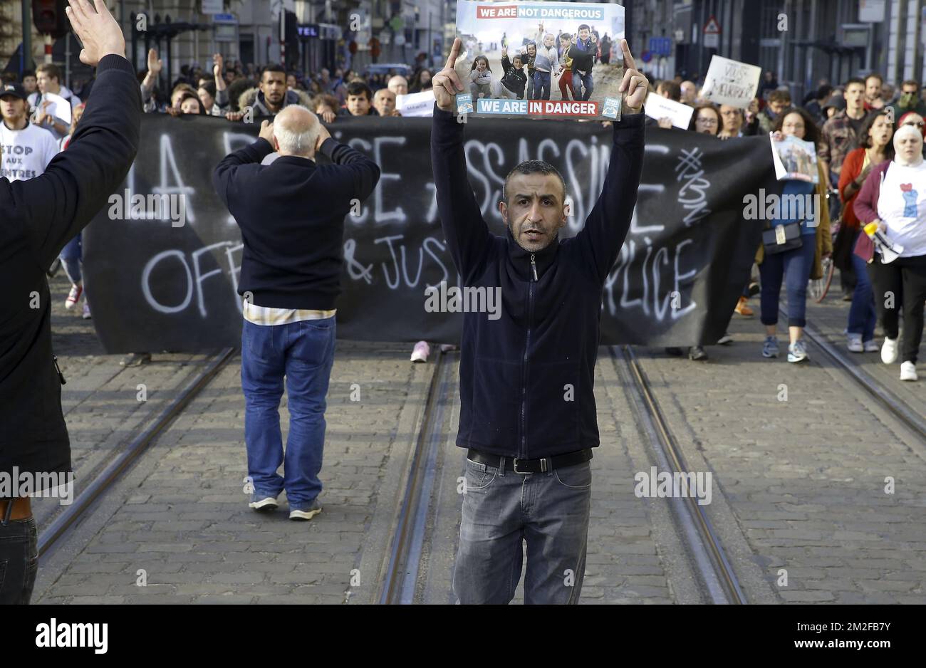 Illustration picture shows a protest action organised by several associations of defence of asylum seekers' rights, in front of the immigration office in Brussels, after a three years old girl named Madwa died yesterday after a speed chase with police, Friday 18 May 2018. Around thirty persons were inside a vehicle, from Kurds origins, most likely on their way to Calais. BELGA PHOTO NICOLAS MAETERLINCK Stock Photo