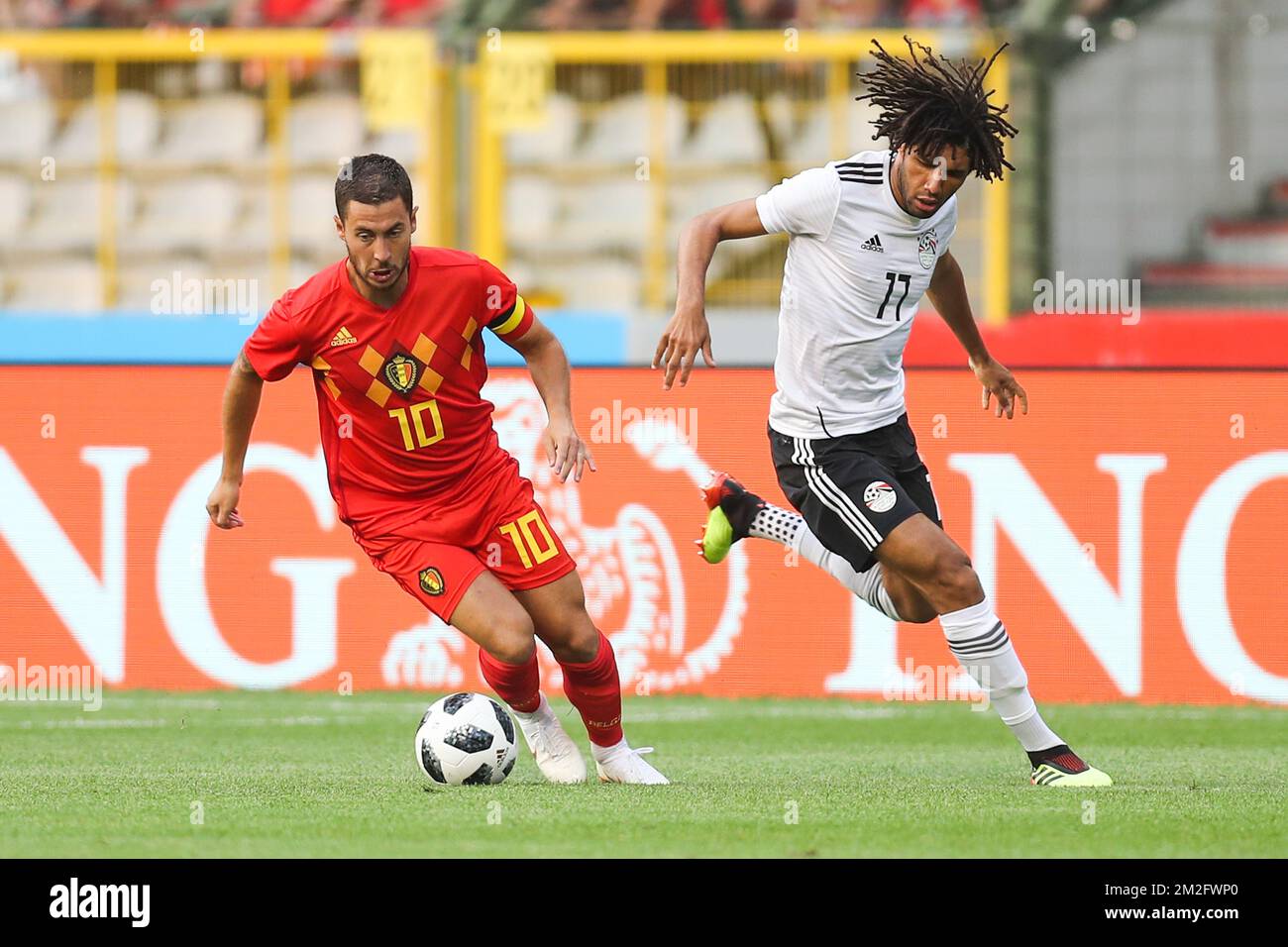 Belgium's Eden Hazard and Egypt's Kahraba fight for the ball during a friendly game between Belgium national team, The Red Devils and Egyptian national soccer team, Wednesday 06 June 2018, in Brussels. Both teams prepare the upcoming FIFA World Cup 2018 in Russia. BELGA PHOTO BRUNO FAHY Stock Photo