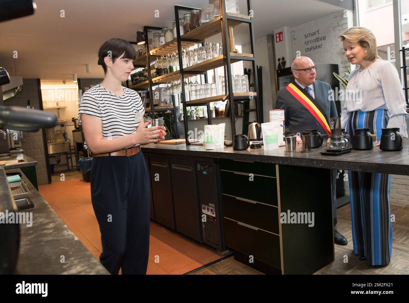 Queen Mathilde of Belgium and Gent mayor Daniel Termont taste a cup of coffee during a royal visit to the 'microStart' microcredit financing project in Gent, Thursday 07 June 2018. BELGA PHOTO BENOIT DOPPAGNE Stock Photo