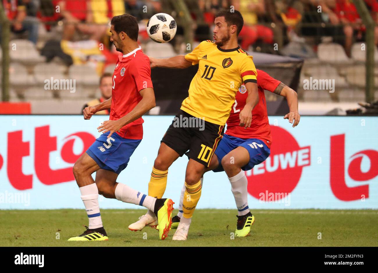 Belgium's Eden Hazard and Costa Rica's Johnny Acosta fight for the ball during a friendly soccer game between Belgian national team The Red Devils and Costa Rica, Monday 11 June 2018, in Brussels. Both teams prepare the upcoming FIFA World Cup 2018 in Russia. BELGA PHOTO VIRGINIE LEFOUR Stock Photo