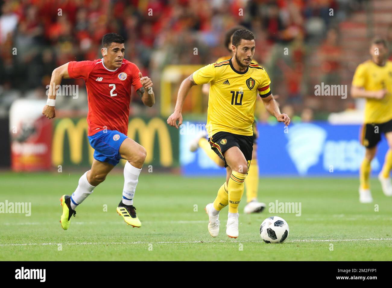 Costa Rica's Johnny Acosta and Belgium's Eden Hazard fight for the ball during a friendly soccer game between Belgian national team The Red Devils and Costa Rica, Monday 11 June 2018, in Brussels. Both teams prepare the upcoming FIFA World Cup 2018 in Russia. BELGA PHOTO BRUNO FAHY Stock Photo