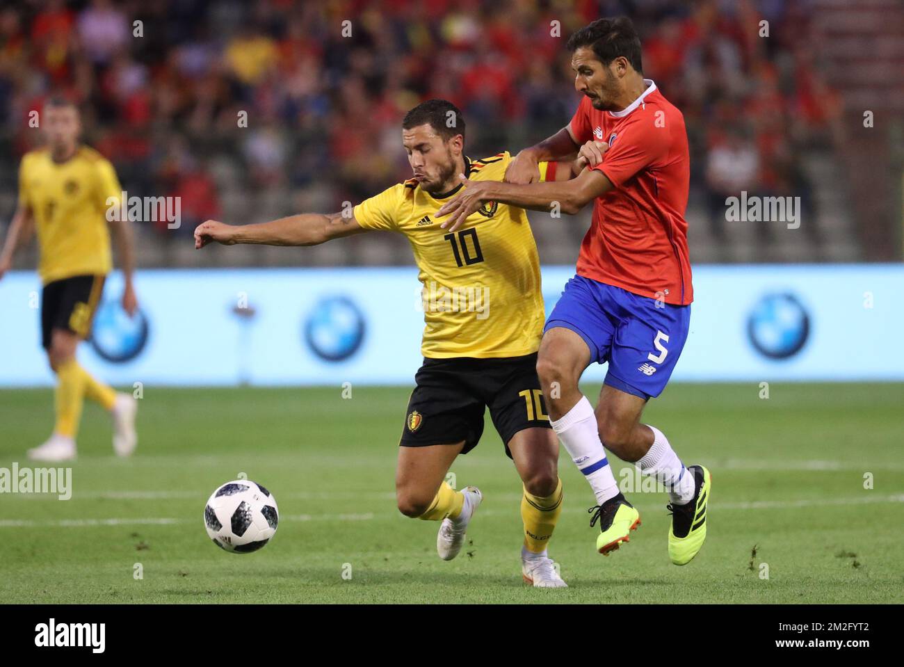 Belgium's Eden Hazard and Costa Rica's Celso Borges fight for the ball during a friendly soccer game between Belgian national team The Red Devils and Costa Rica, Monday 11 June 2018, in Brussels. Both teams prepare the upcoming FIFA World Cup 2018 in Russia. BELGA PHOTO VIRGINIE LEFOUR Stock Photo