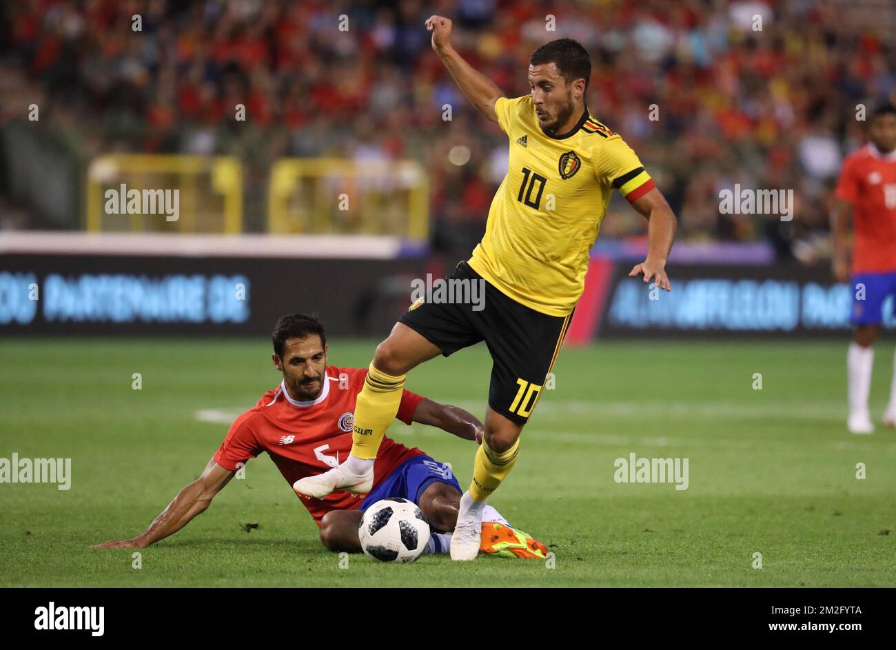 Costa Rica's Celso Borges and Belgium's Eden Hazard fight for the ball during a friendly soccer game between Belgian national team The Red Devils and Costa Rica, Monday 11 June 2018, in Brussels. Both teams prepare the upcoming FIFA World Cup 2018 in Russia. BELGA PHOTO VIRGINIE LEFOUR Stock Photo