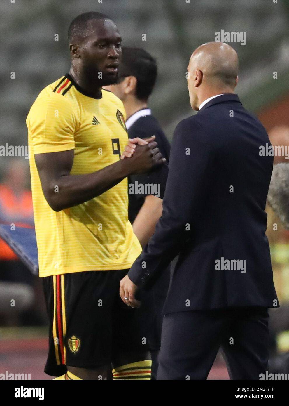 Belgium's Romelu Lukaku, Belgium's head coach Roberto Martinez shake