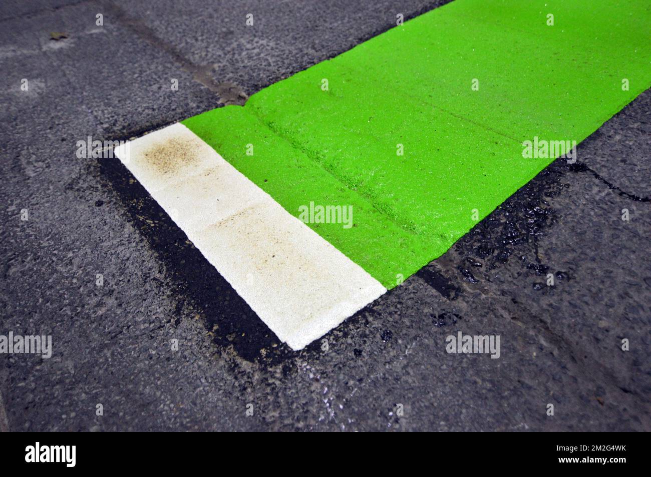 Closeup photo of a new green bikeway road marking in downtown Halifax, Canada Stock Photo Alamy