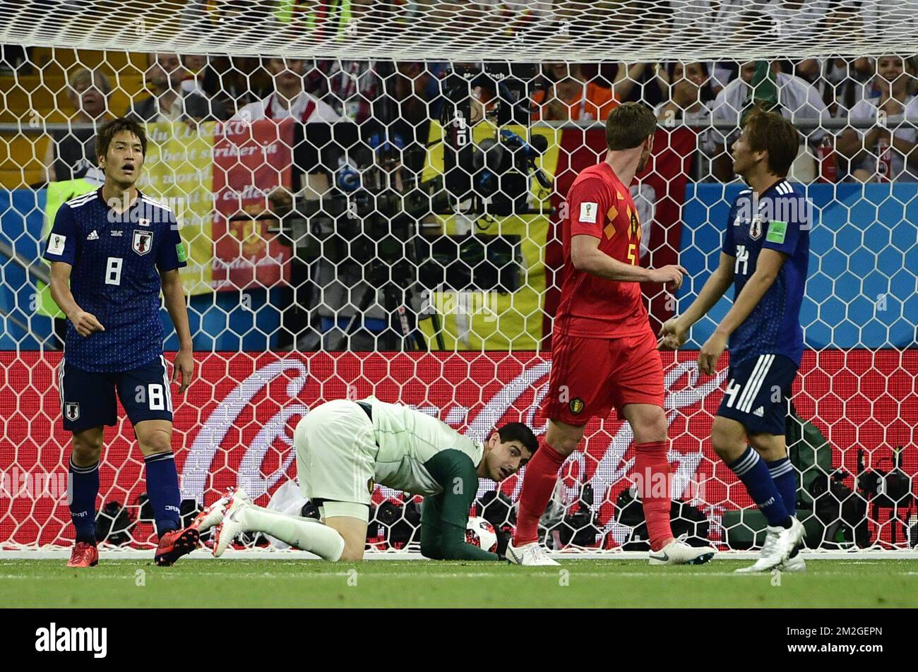 Japan's Genki Haraguchi, Belgium's Goalkeeper Thibaut Courtois, Belgium ...