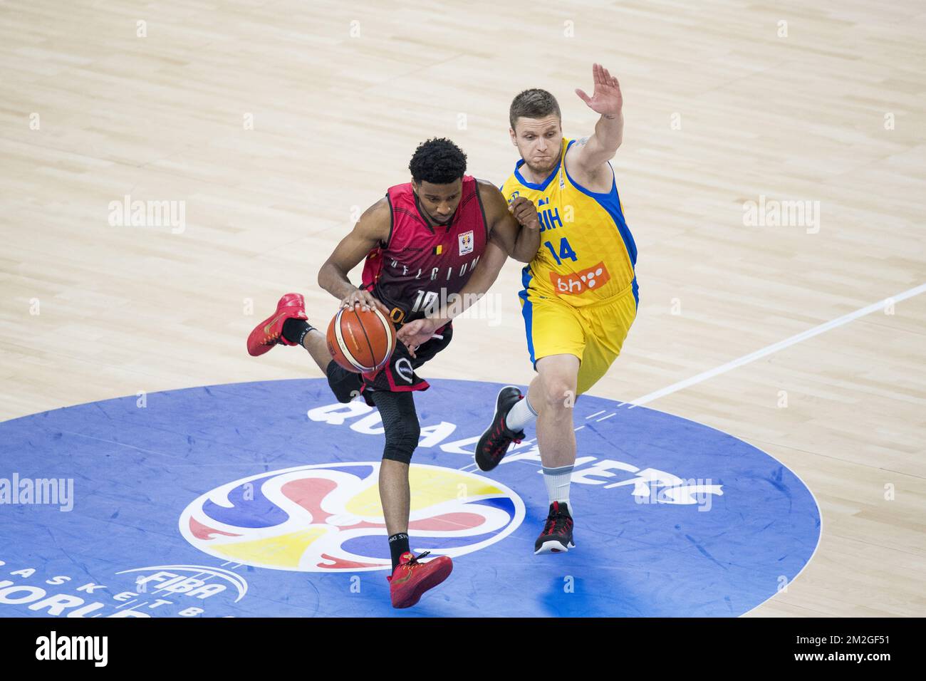 Belgium's Loic Schwartz and Bosnia's Almir Hasandic fight for the ball during basketball game between Belgium's Belgian Lions and Bosnia & Herzegovina, the sixth and last qualification game for world cup 2019 in the group E, Monday 02 July 2018 in Merksem, Antwerp. BELGA PHOTO JASPER JACOBS Stock Photo