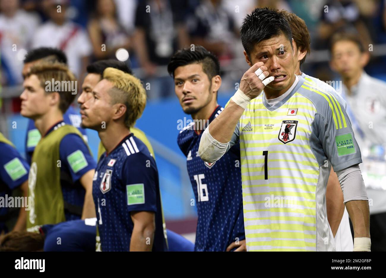 Japan's Hotaru Yamaguchi and Japan's goalkeeper Eiji Kawashima react as they lost a round of 16 game between Belgian national soccer team the Red Devils and Japan in Rostov, Russia, Monday 02 July 2018. BELGA PHOTO LAURIE DIEFFEMBACQ Stock Photo