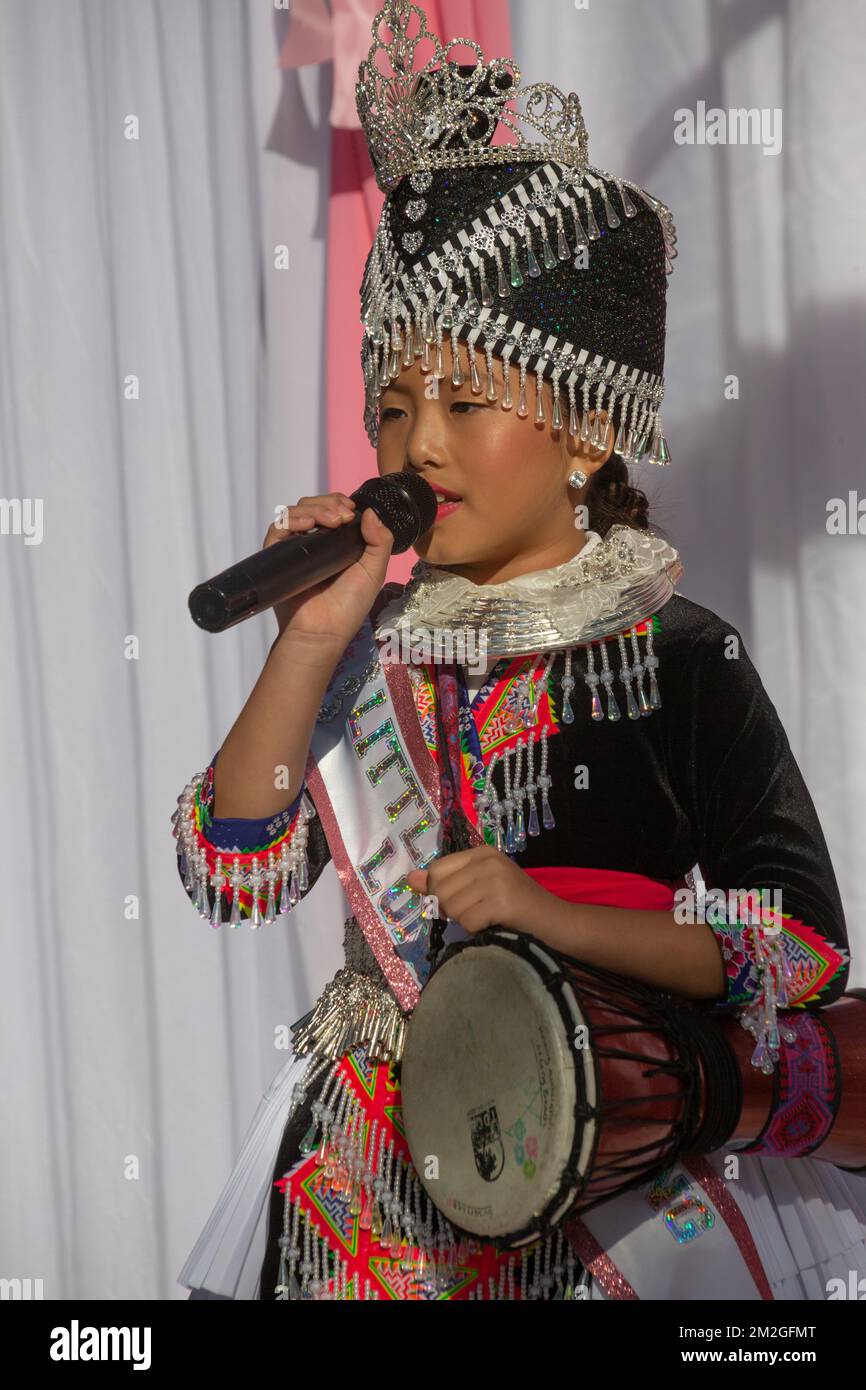 Little Miss Hmong sings at the Hmong New Year Celebration at El Dorado