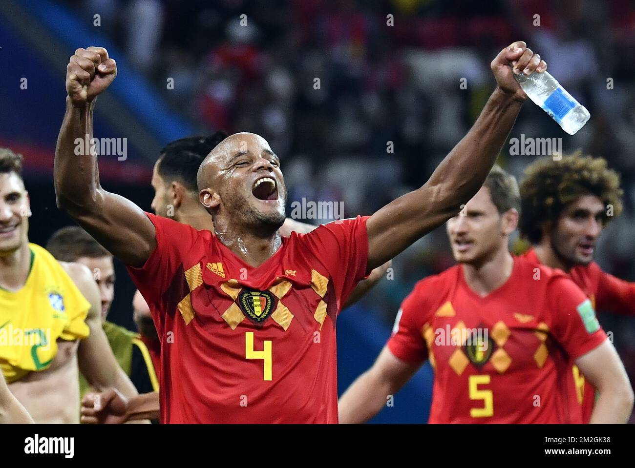Belgium's Vincent Kompany celebrates after winning a soccer game between Belgian national soccer team the Red Devils and Brazil in Kazan, Russia, Friday 06 July 2018, the quarter-finals of the 2018 FIFA World Cup. BELGA PHOTO DIRK WAEM  Stock Photo