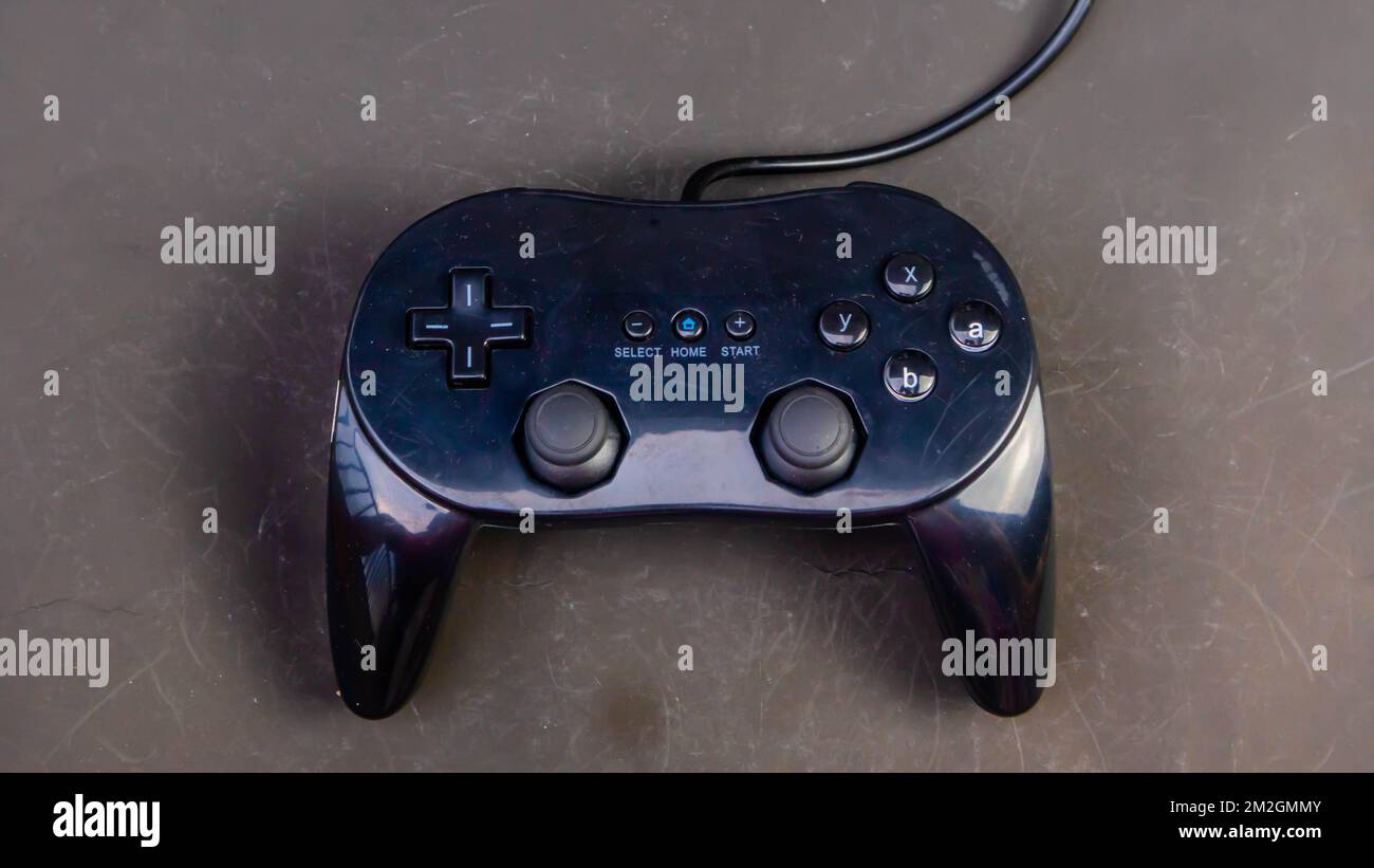 black joystick isolated on black background Stock Photo - Alamy