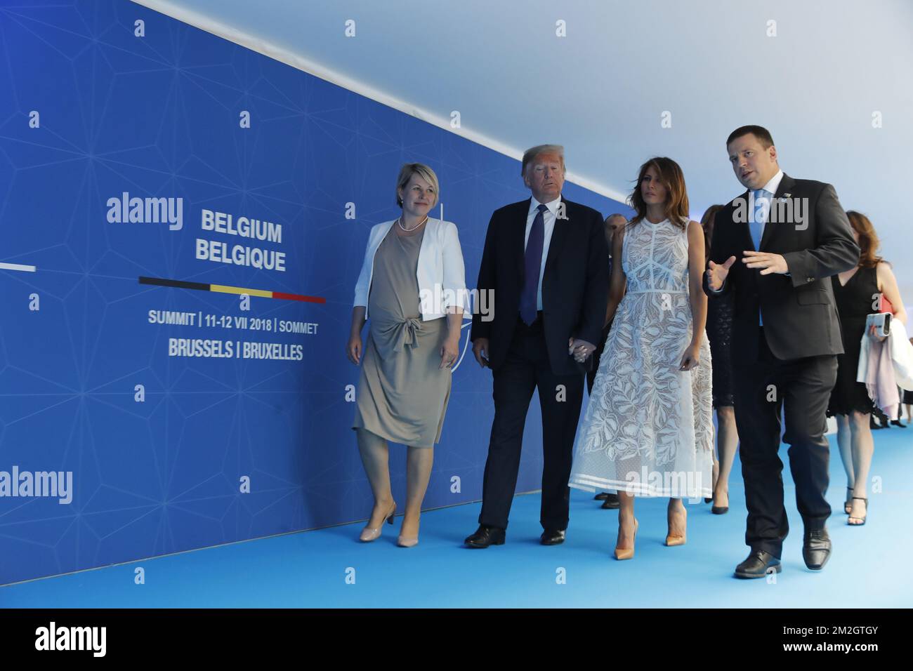 Karin Ratas, wife of Estonia PM, US President Donald Trump, First Lady of  the US Melania Trump and Prime Minister of Estonia Juri Ratas pictured  during a walk in the Parc du