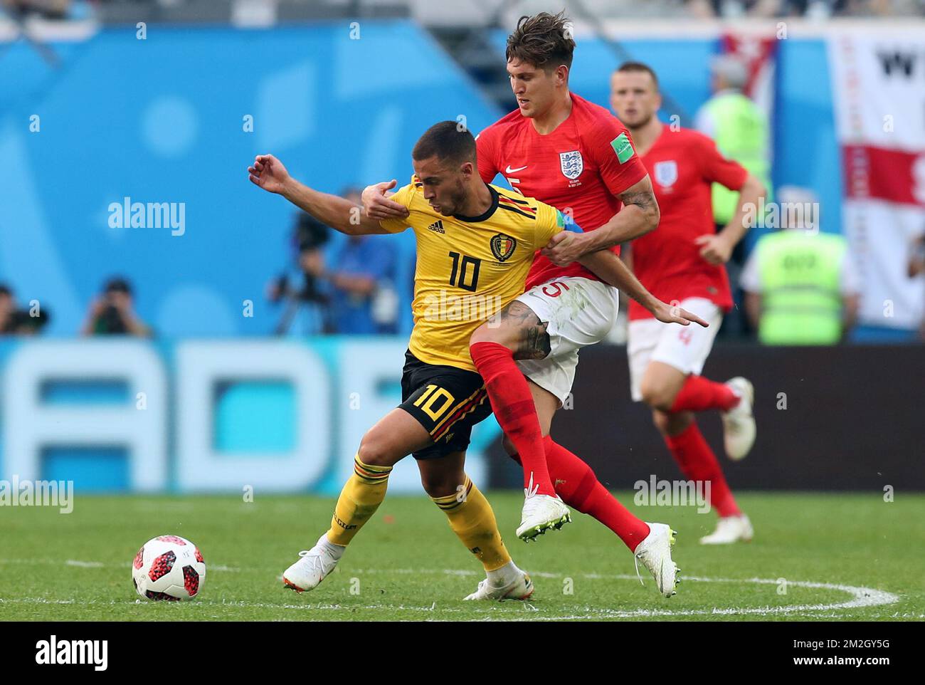 Belgium's Eden Hazard and England's John Stones pictured in action during a soccer game between Belgian national soccer team the Red Devils and England, the third place play-off of the 2018 FIFA World Cup, Saturday 14 July 2018 in Saint-Petersburg, Russia. BELGA PHOTO BRUNO FAHY Stock Photo