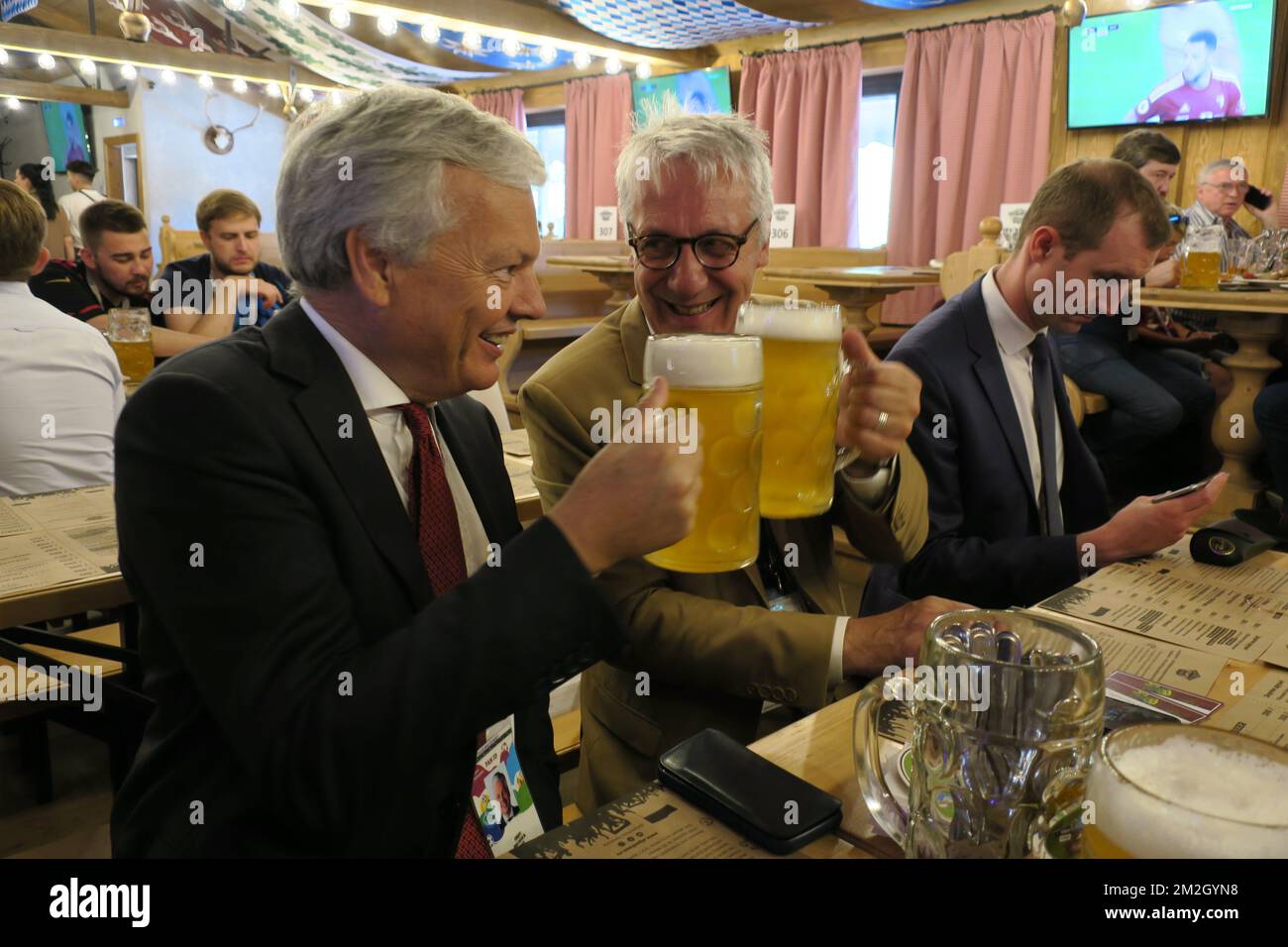 Belgian Foreign Minister Didier Reynders cheers with his head of cabinet, Luc De Lobel in a supporters chalet called Alpenhaus, ahead of a soccer game between Belgian national soccer team the Red Devils and England, the third place play-off of the 2018 FIFA World Cup, Saturday 14 July 2018 in Saint-Petersburg, Russia. BELGA PHOTO AXEL CLEENEWERCK DE CRAYENCOUR Stock Photo