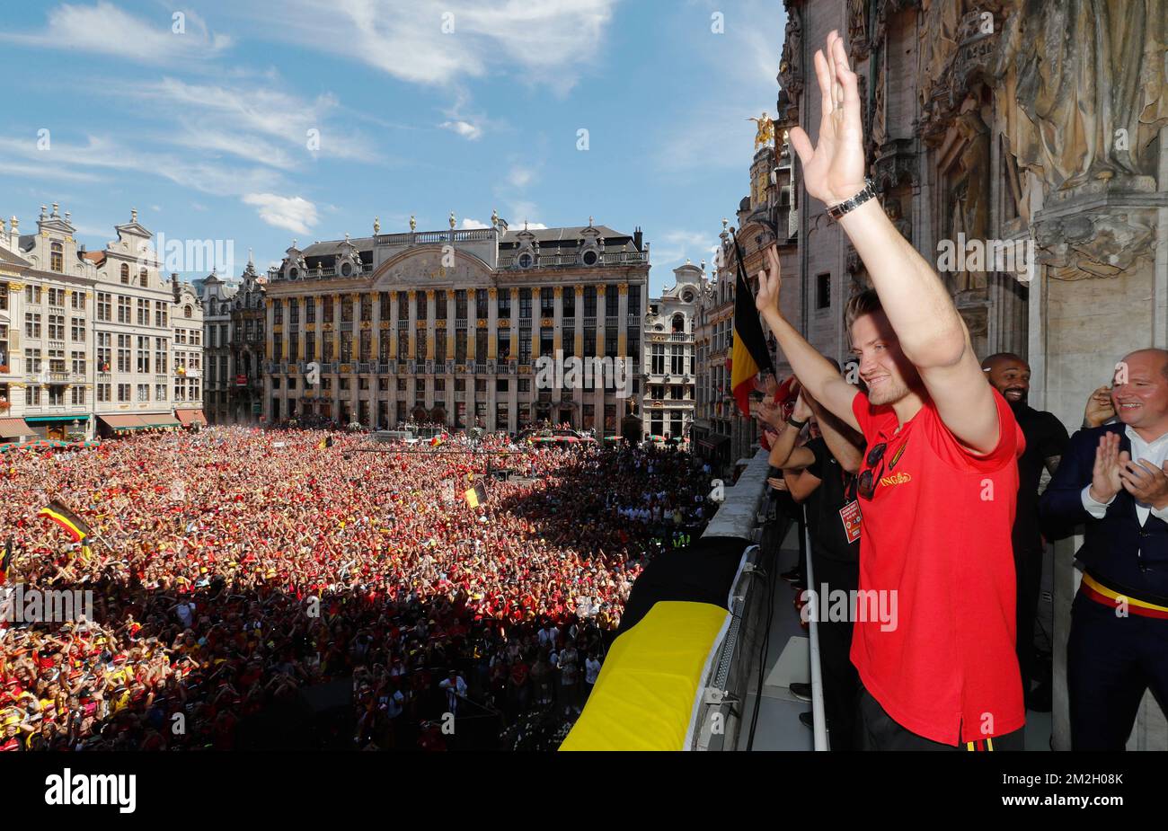 Belgium's goalkeeper Simon Mignolet celebrates at the balcony in front of more than 8000 supporters at the Grand-Place - Grote Markt in Brussels city center, as Belgian national soccer team Red Devils come to celebrate with supporters at the balcony of the city hall after reaching the semi-finals and winning the bronze medal at the 2018 Soccer World Cup in Russia, Sunday 15 July 2018. BELGA PHOTO POOL YVES HERMAN  Stock Photo