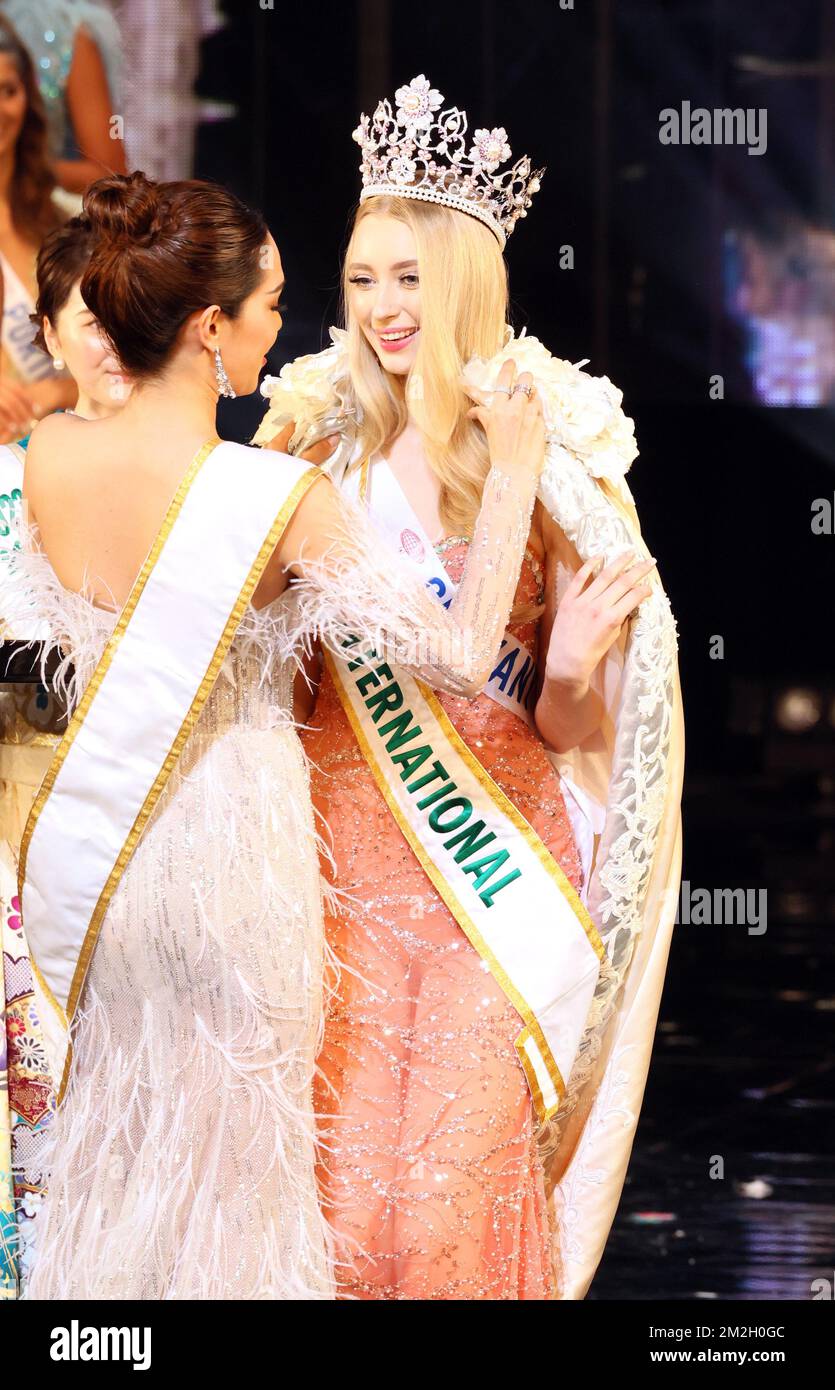 Tokyo, Japan. 13th Dec, 2022. Miss International 2019 Sireethorn Leearamwat (L) of Thailand puts a gown to Miss Germany Jasmin Selberg (R) of Miss International 2022 at the Miss International Beauty Pageant 2022 in Tokyo on Tuesday, December 13, 2022. 66 beauties from the world gathered in Tokyo for the Miss International Beauty pageant, the first time in three years. Credit: Yoshio Tsunoda/AFLO/Alamy Live News Stock Photo