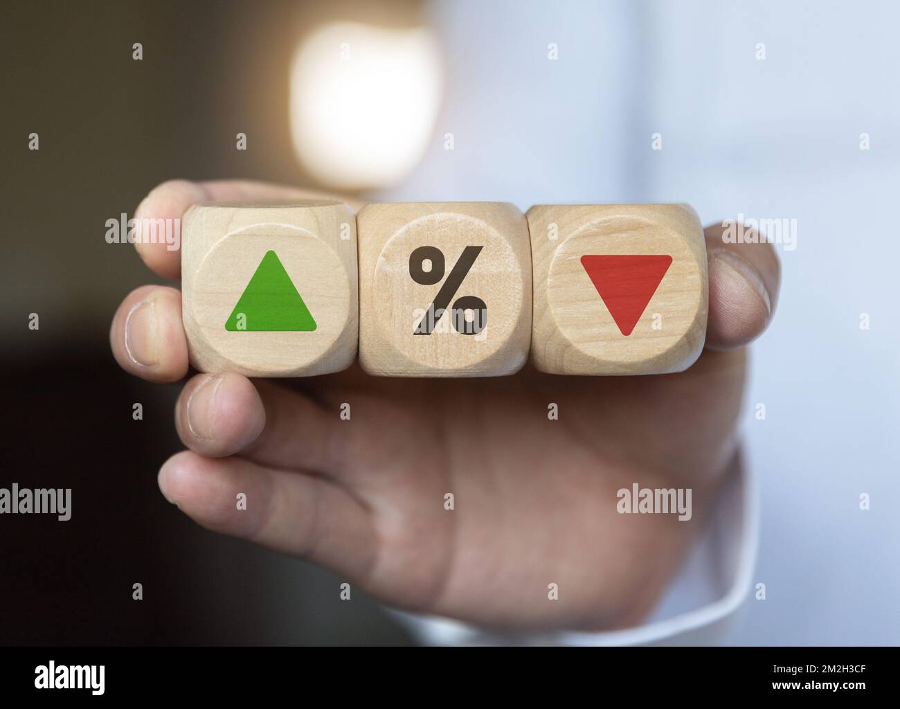 business man Hand change wood cube block with percentage to UP and Down ...