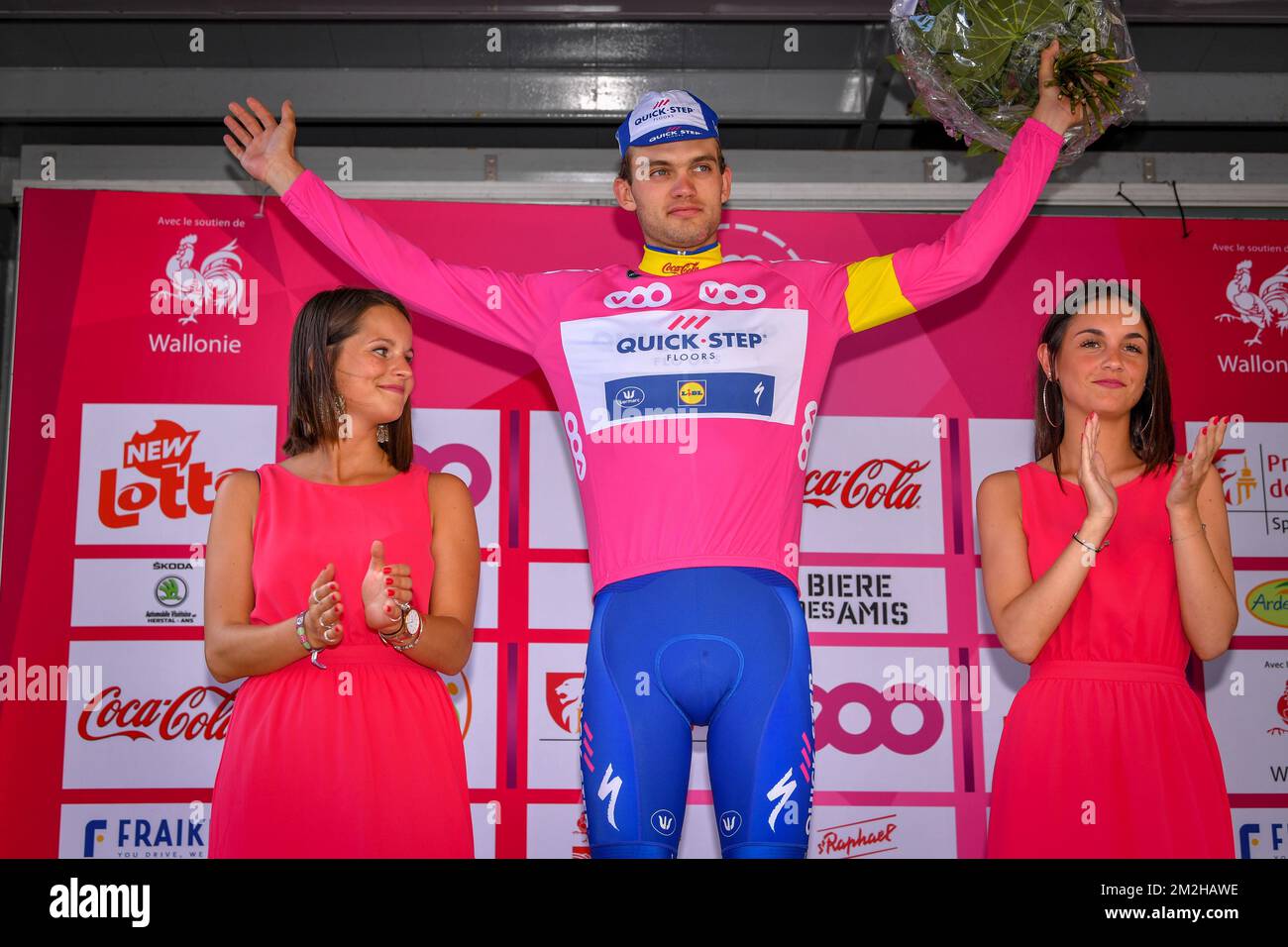 Danish Kasper Asgreen and of team Quick-Step Floors celebrates on the  podium wearing the pink sprints jersey after the second stage of the Tour  De Wallonie cycling race, 167,2 km from Villers-la-Ville