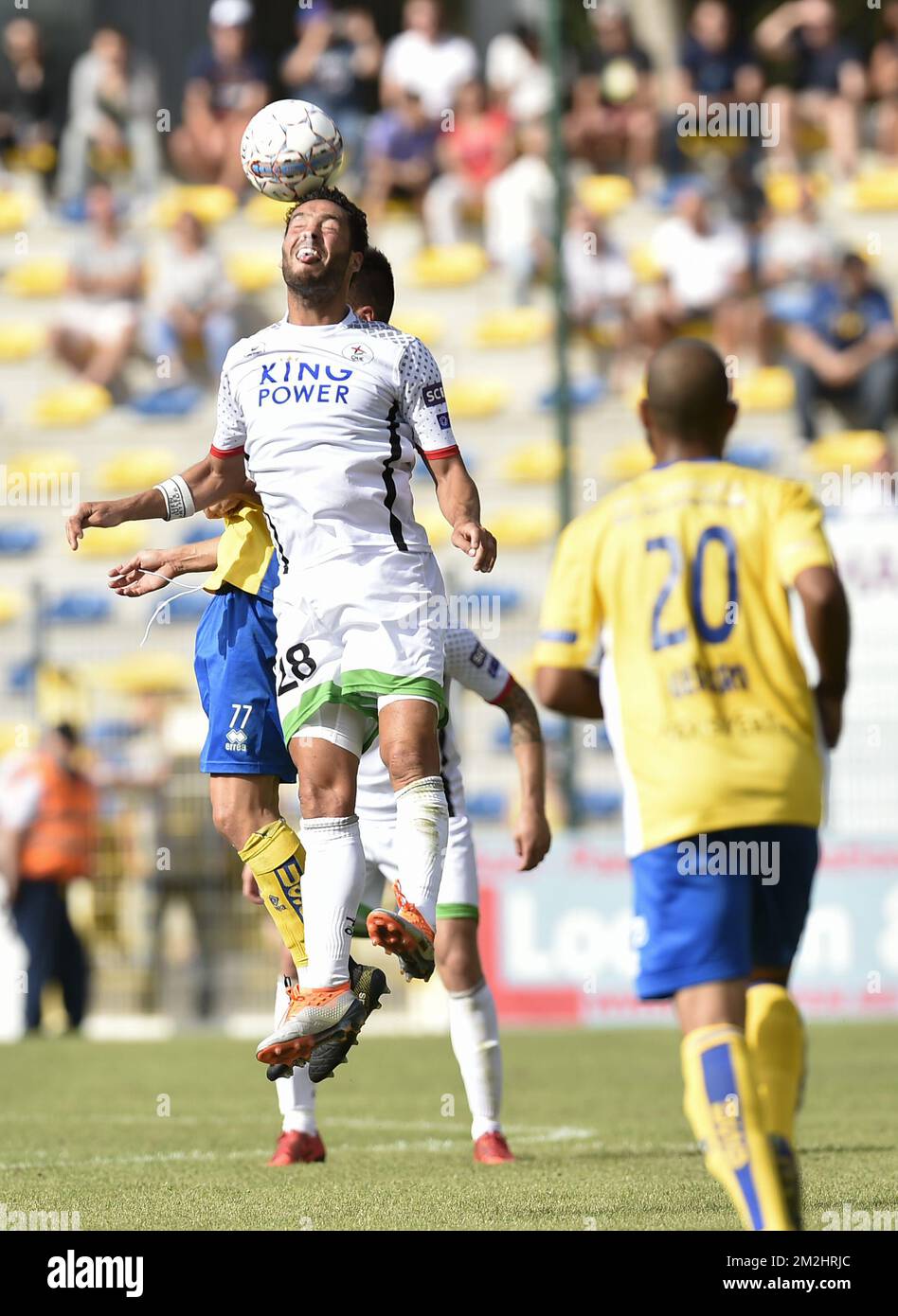 OHL's Koen Persoons fights for the ball during a soccer game between