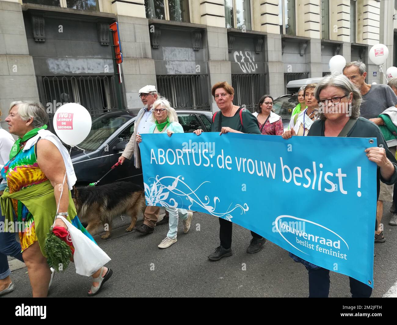 Women carry a banner that reads 'Abortus: de vrouw beslist' (Abortion, the woman decides), during a protest pro abortion, organised by the 'Collectif des 350', in Brussels, Sunday 09 September 2018. The participants demand that abortion is properly depenalised and becomes a right for women. They claim the upcoming change of the abortion law is not going far enough. BELGA PHOTO ANTONY GEVAERT  Stock Photo